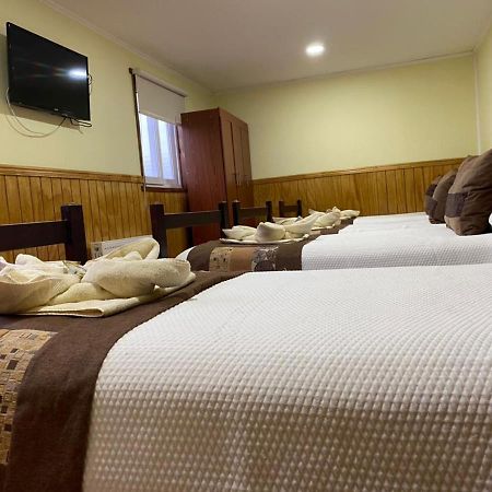 Hostal America En بويرتو ناتالز المظهر الخارجي الصورة