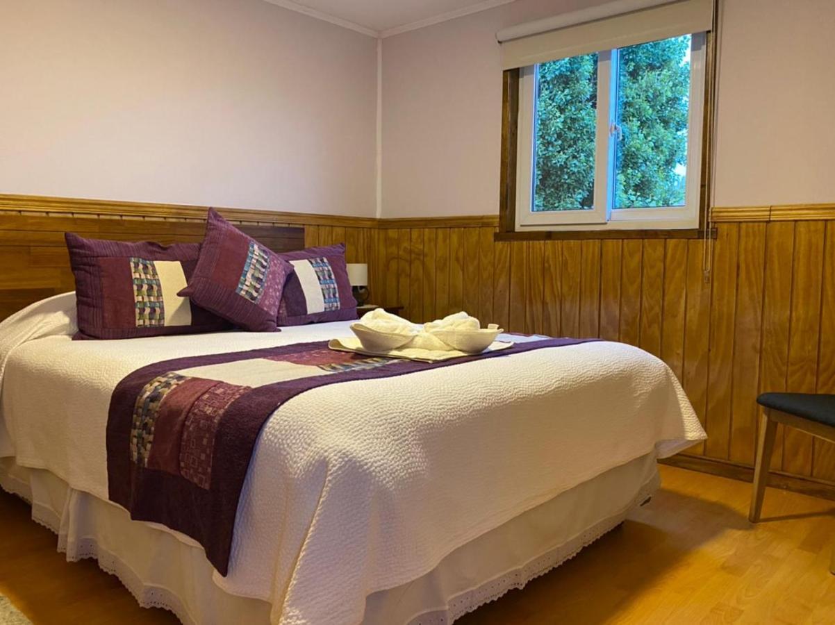 Hostal America En بويرتو ناتالز المظهر الخارجي الصورة