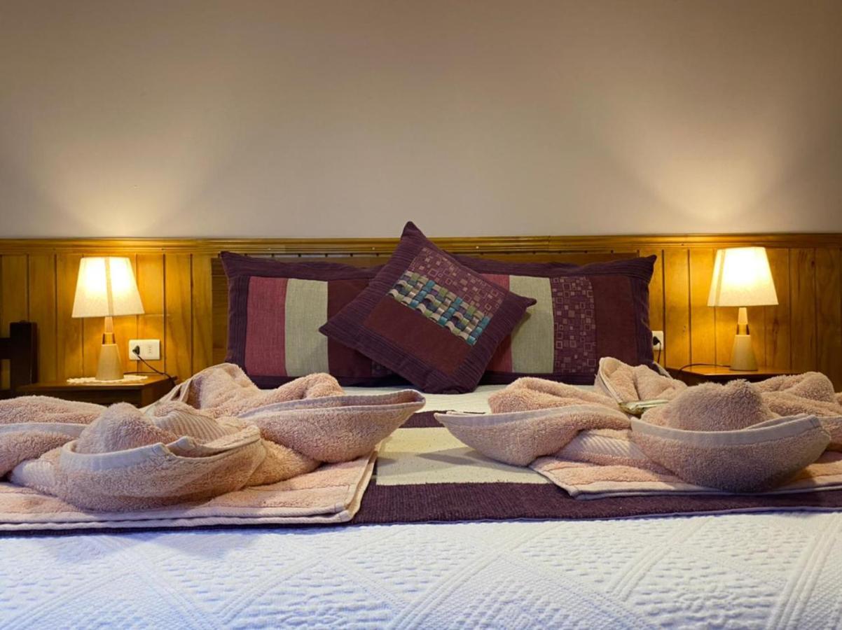 Hostal America En بويرتو ناتالز المظهر الخارجي الصورة
