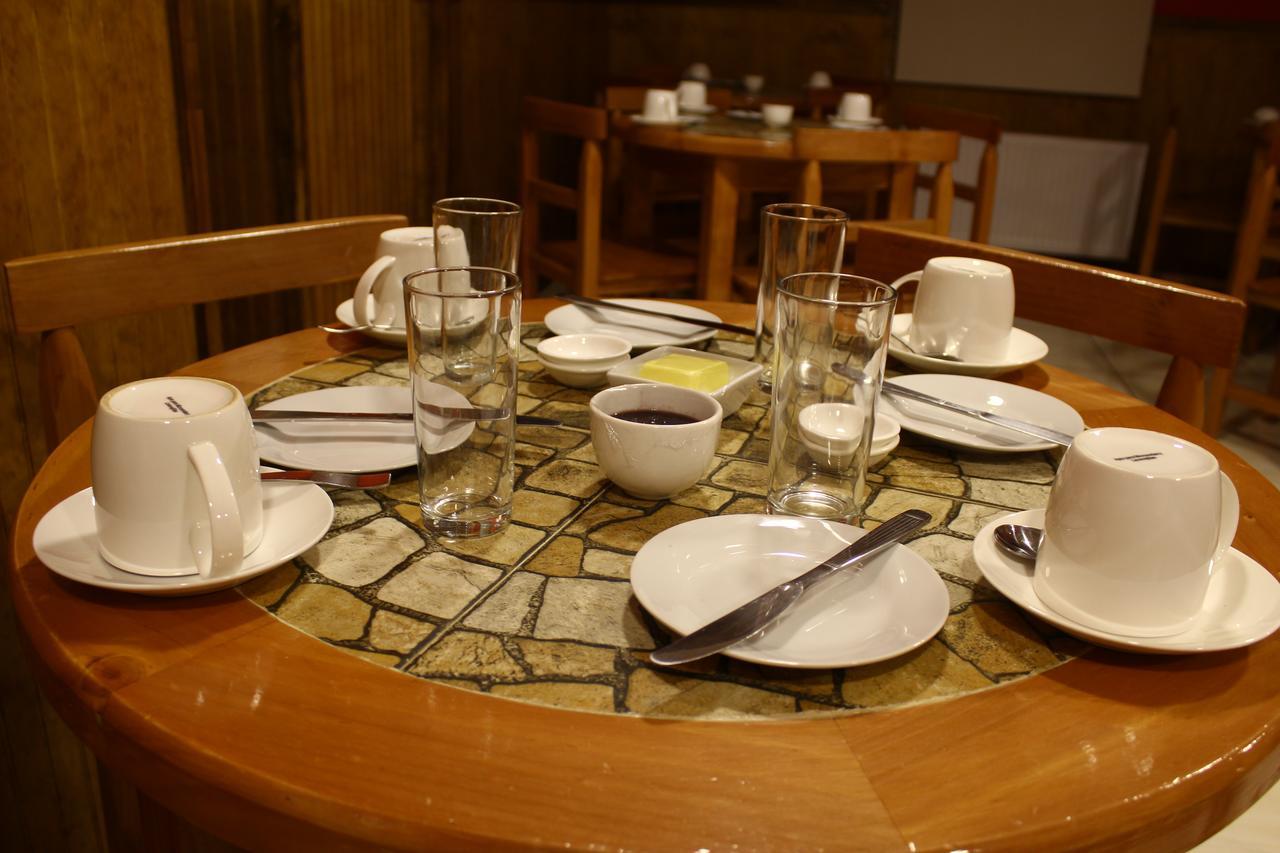 Hostal America En بويرتو ناتالز المظهر الخارجي الصورة